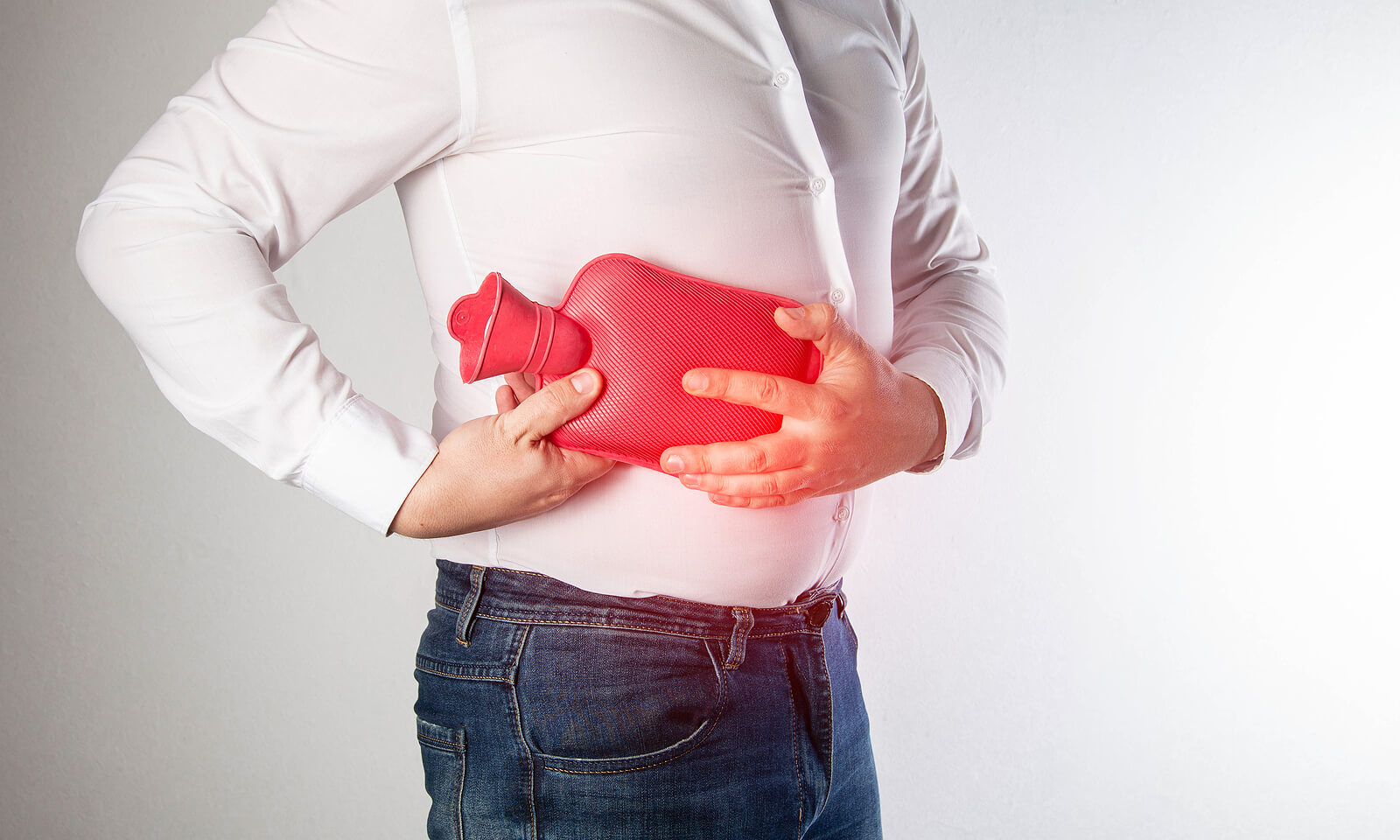 Using a Hot Water Bottle to Aid Abdominal Strain Recovery