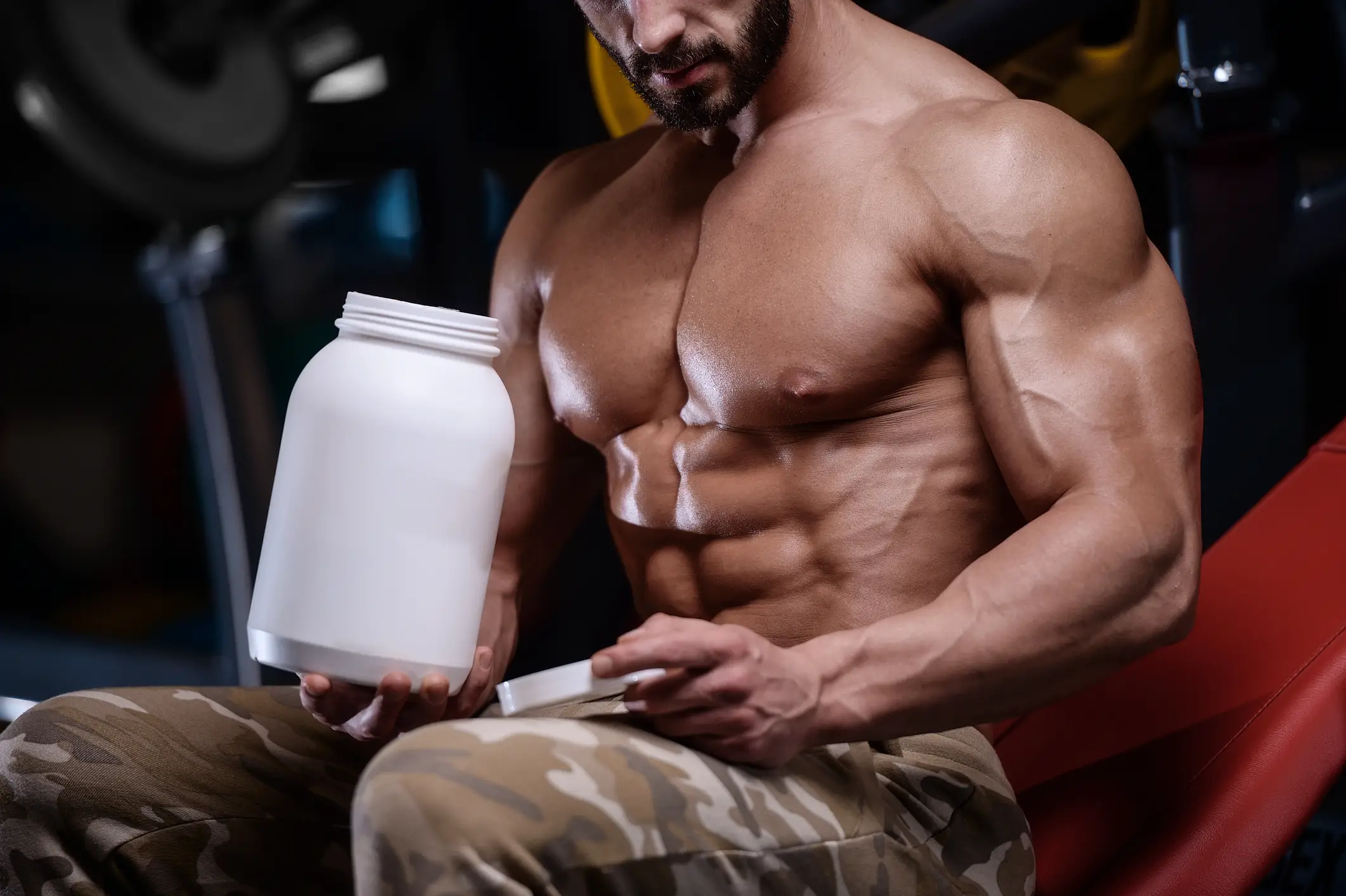 Man using supplements to enhance and benefit his training