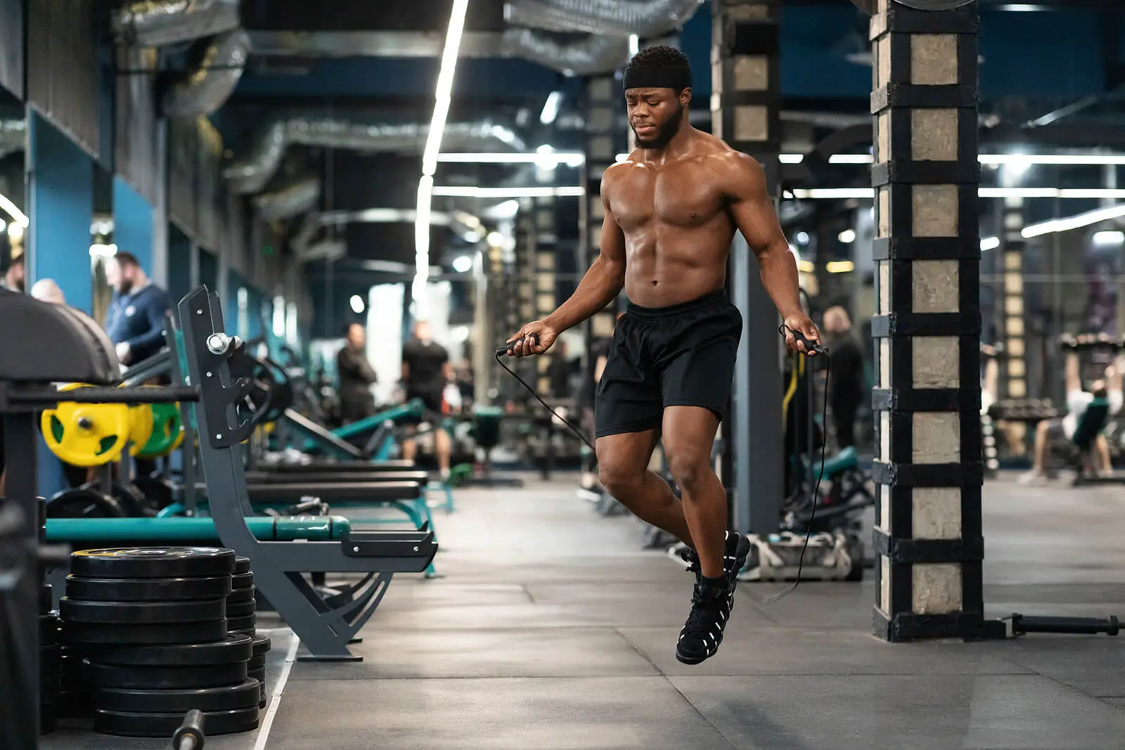 Cardio Workout. Shirtless Muscular African American Man Jumping